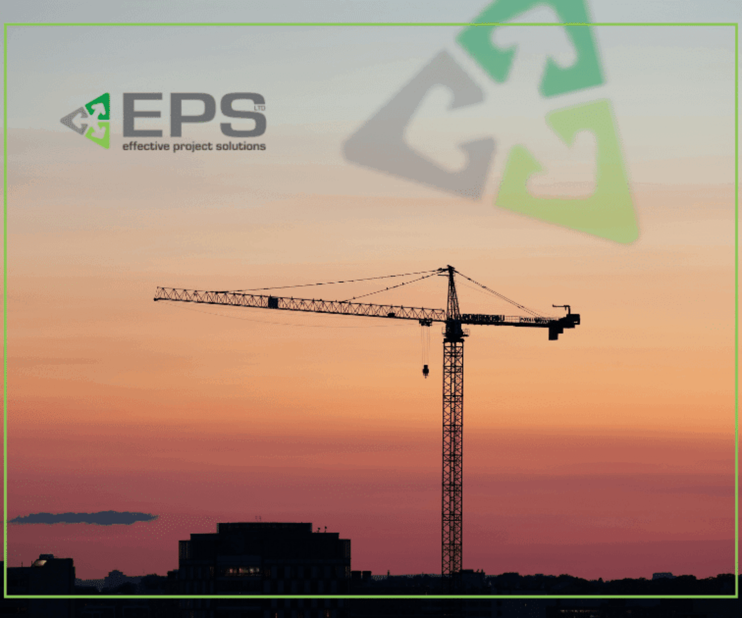 image shows construction crane backlit by sunset
